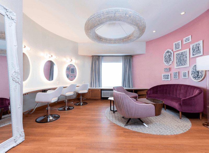 bridal suite room with chairs and make up stations